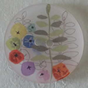 Bouton rond translucide motif fleur en couleur 38 mm