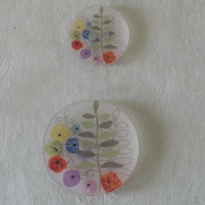 Bouton rond translucide motif fleur en couleur
