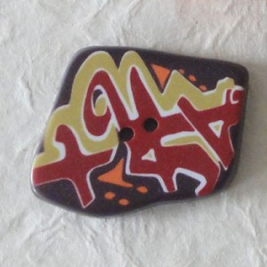 Bouton Graffiti 38 mm - Marron foncé
